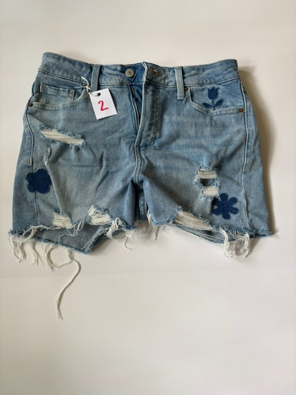Old Navy denim shorts with flower patches size 6